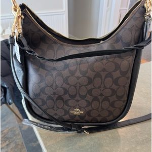 Brand new Coach Jules Hobo purse in signature canvas